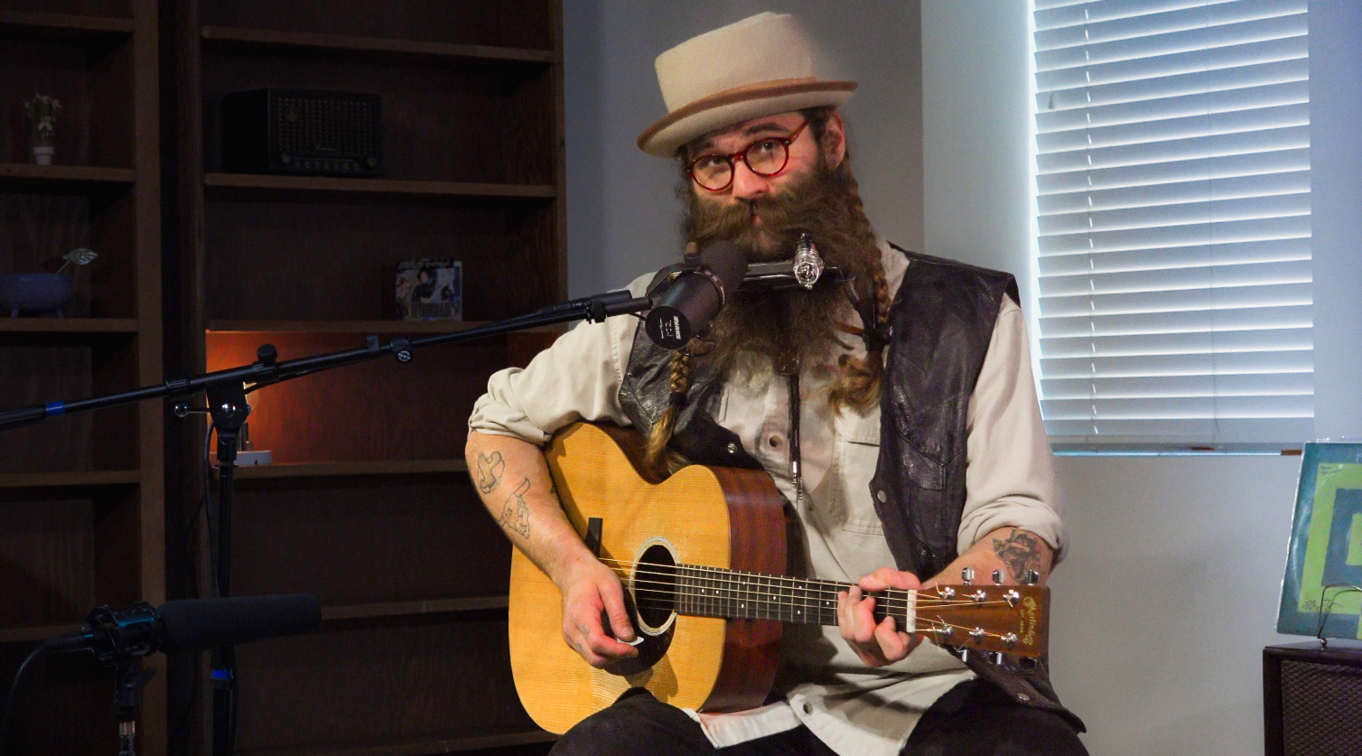 Danny Savage plays guitar in the DMA Studio